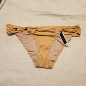 Victoria's Secret Bikini bottom. Tan with gold embellish. Size Large
